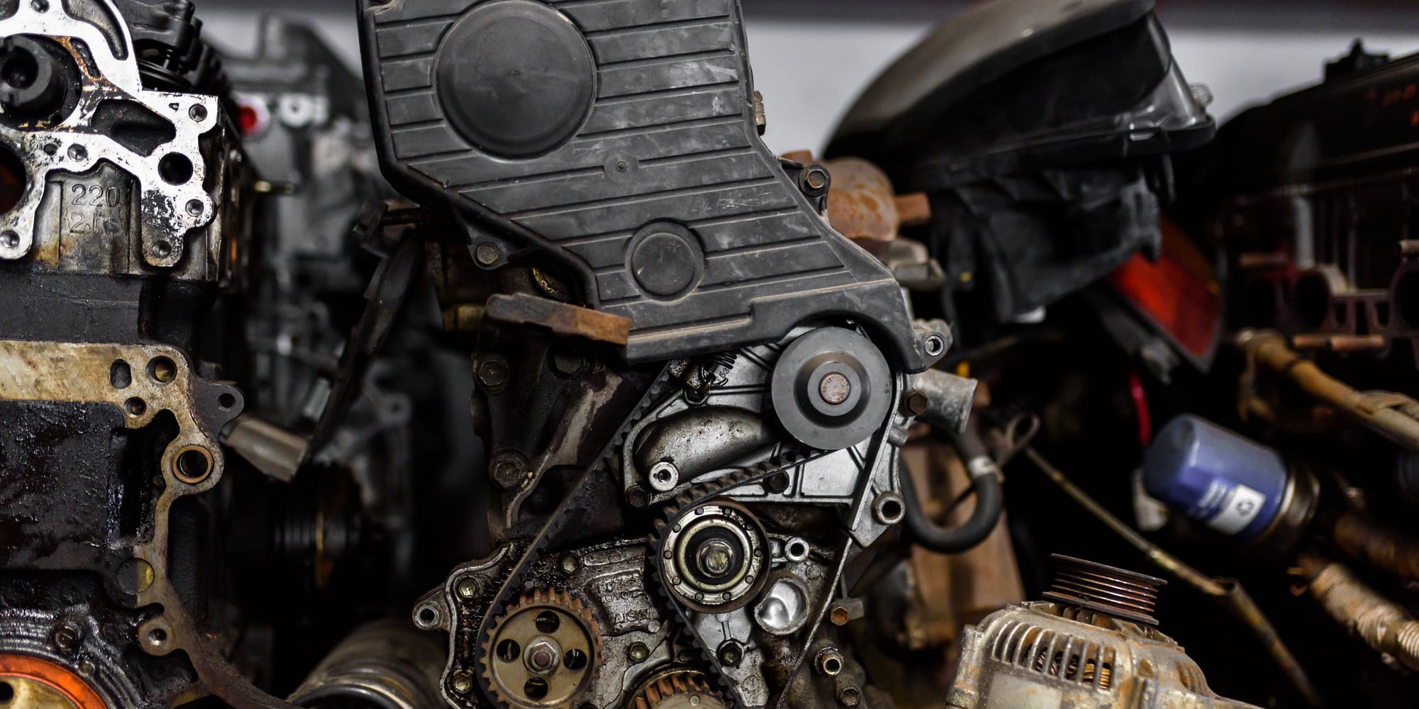 A partially disassembled engine showing its timing gears and internal components